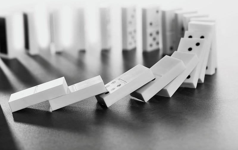 Visualization of mathematical induction through dominoes.