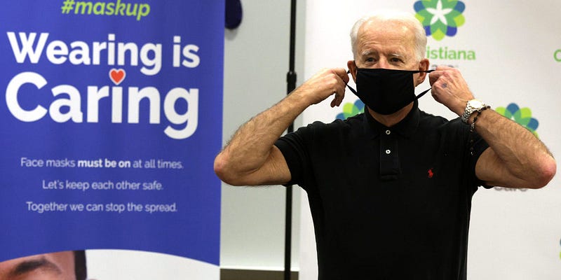 Biden wearing a mask after vaccination