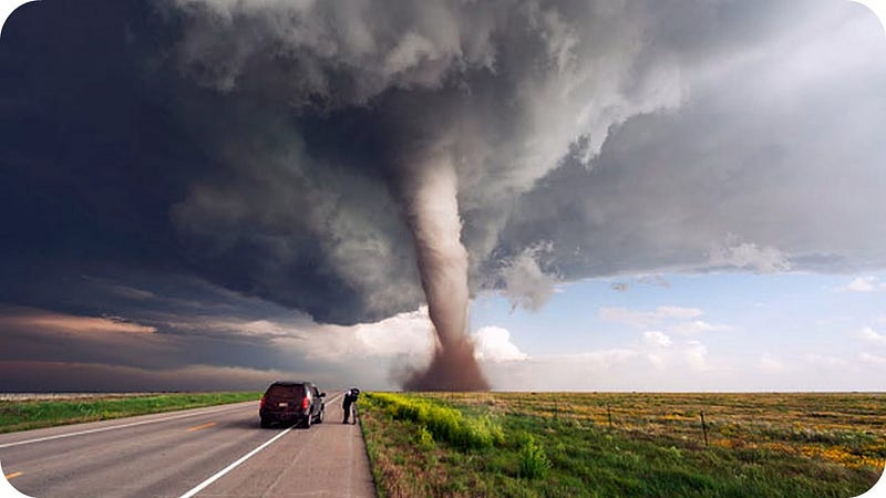 Tornado chaser capturing storm activity