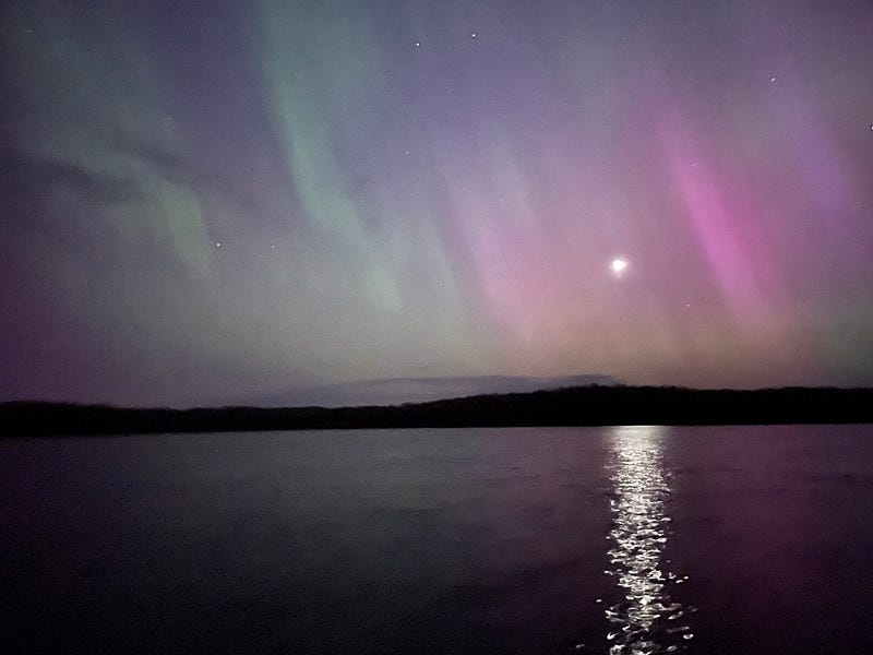 A tranquil scene from our lakeside dock under the night sky.