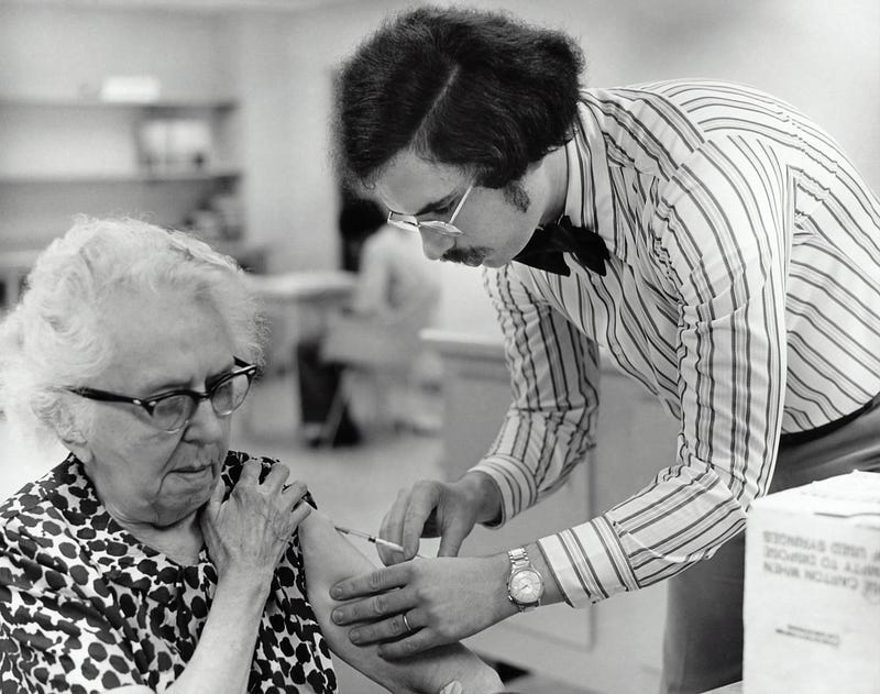 Historical depiction of early vaccination methods